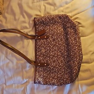 Maroon and white coach bag